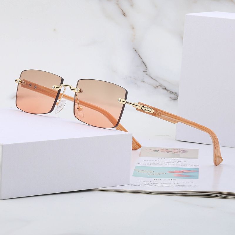 Fashion frameless sunscreen sunglasses women's trendy high-end ins wood grain sunglasses men's wholesale